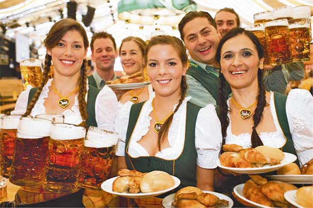 Photo courtesy of www.goeckelesmaier.deAt the Stuttgart Spring Festival, enjoy a rotisserie chicken and a beer at one of the many fest tents. 