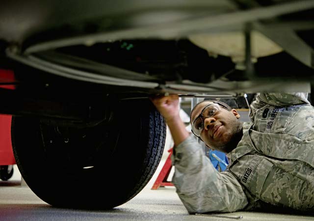 Airman 1st Class Desmond Oates, 86th Maintenance Squadron aerospace ground equipment technician, removes an air compressor’s fender at the new AGE facility April 22 on Ramstein. The new facility relocated AGE Airmen under one roof to increase efficiency and continuity.