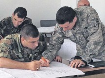 Courtesy photoStaff Sgt. Luis Devotto, 435th Air Ground Operations Wing’s Contingency Readiness Group Air Adviser Branch air adviser special vehicle maintenance, goes over a schematic of a Halvorsen Loader aircraft loader with a Bulgarian Joint Forces Command members in Plovdiv, Bulgaria. Devotto and Staff Sgt. Jonathan Rasmussen, 48th Logistics Readiness Squadron transportation specialist from Royal Air Force Lakenheath, England, trained 16 members for two Bulgarian movement control teams on the operations and maintenance of a Halvorsen Loader.