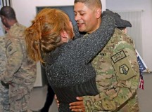 Army Reserve Staff Sgt. Johnny Sarabia, a member of the 209th Digital Liaison Detachment (Forward), hugs his wife, Claudia, for the first time in over four months Oct. 7 during a redeployment ceremony for 28 Army Reserve Soldiers from the 7th Civil Support Command’s 209th DLD (FWD) and the 406th Human Resources Company, as they arrived from missions supporting Operation Enduring Freedom in Afghanistan, Kuwait and other Middle Eastern countries.