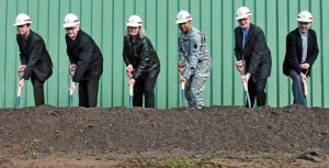 Photo courtesy of the U.S. Army (From left) Andreas Schepers, Norbel Hoebel, Donna L. Street, Maj.  Gen. Aundre F. Piggee, Helmut Haufe and Paul Lindemeber dig the first shovels of dirt for the Theater Logistics Support Center-Europe fuel purging station April 12 at the Kaiserslautern Army Depot.