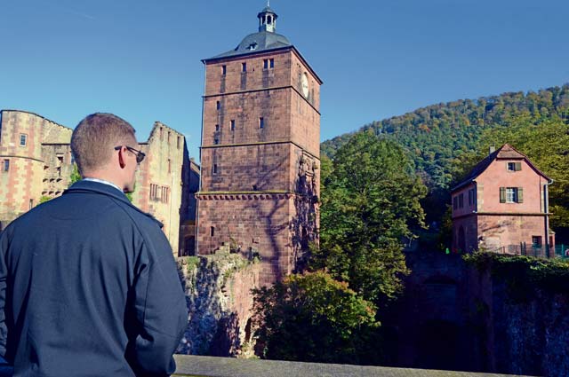 A redeployer going through the Air Force Deployment Transition Center gazes over the landscape at Heidelberg Castle Oct. 24 in Heidelberg, Germany. Redeployers go on an experiential outing during their time at the DTC to help them transition back into less threatening environments before going back home.