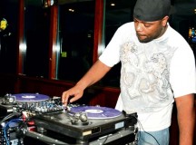 Staff Sgt. Christopher Hunt, video teleconference specialist with the 21st Theater Sustainment Command, works the turntables in the Battle of the DJs competition Jan. 9 at Armstrong’s Club.