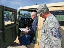 Retired Chief Master Sgt. Gerald Richards, 1st Combat Communication Squadron alumnus, and Master Sgt. Dana Leonard, 1st CBCS plans and 
support director, take a look into a HUMVEE Aug. 15 on Ramstein.