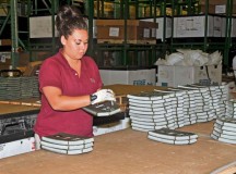 Photo by Staff Sgt. Warren W. Wright Jr.Michell Day, a material handler with R4’s Non-Destructive Test Equipment mobile team, tests the structural stability of a ballistic armor plate Aug. 29 on Rhine Ordnance Barracks. Eight members of the NDTE mobile team traveled to Kaiserslautern to conduct required inspections on the more than 50,000 armor plates in circulation throughout U.S. Army Europe.