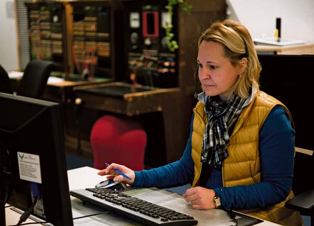 Photo by Sara PavichSwitchboard shift supervisor Maria Caetano connects a caller to the correct organization Feb. 5 on Ramstein. Caetano has worked at the U.S. Air Forces in Europe Consolidated Switchboard for 14 years and speaks five languages.