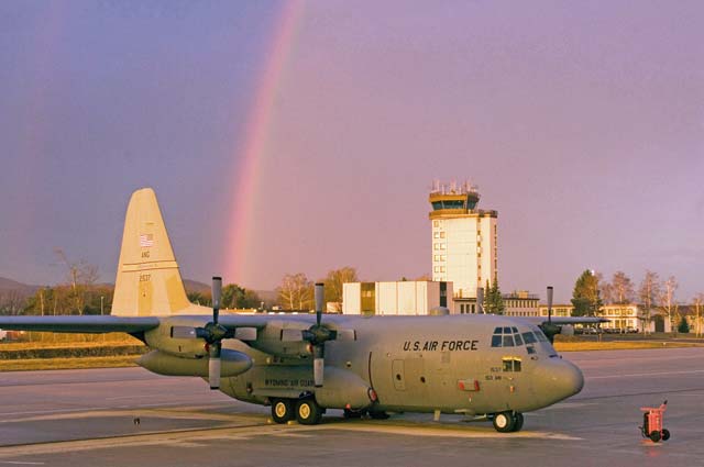 Photo by Master Sgt. John E. LaskyA rainbow appears over a C-130 Hercules and the air traffic control tower at Ramstein Air Base March 27, 2006. The air transport aircraft belongs to the 187th Airlift Squadron of the Wyoming Air National Guard in Cheyenne.