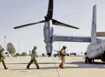 Photos by Lance Cpl. Caleb McDonaldMordente, Col. William Ward, 86th Operations Group commander, and 86th AW Command Chief Master Sgt. James A. Morris board an MV-22 Osprey for an orientation flight.