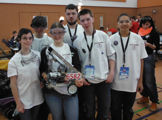 From left, Ellie Burnett, Thomas Dore, Katie Merchat, Josh Merchat, Kaleb Steed and Matthew Jackson, members of the Kaiserslautern High School Robotics Club, pose for a photo during the first Technology Challenge, a competition held recently in Vilsek, Germany.