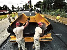 Photo by Senior Airman Kenneth Holston
Senior Airman Ahl Raym Tolrio and Senior Airman Malcolm Stone, both assigned to the 823rd RED HORSE Squadron, sift asphalt as it is being laid July 12, 2012, on Aiken Street on Shaw Air Force Base, S.C. The 823rd RHS is an Air Combat Command asset assigned to the Ninth Air Force that operates out of Hurlburt Field, Fla. RED HORSE stands for Rapid Engineer Deployable Heavy Operational Repair Squadron Engineer.
