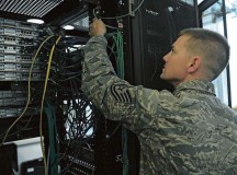 Photo by Senior Airman Caitlin Guinazu
Tech. Sgt. Bradley Johnson, 1st Communications Maintenance Squadron special communication team leader, inspects communication equipment, May 24 on Kapaun.  Johnson has been recognized by the 435th Air Ground Operations Wing as the most recent Thunderbolt Award recipient.