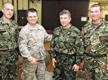 Maj. James Joubert, a physician with the 196th Medical Support Unit of the 21st Theater Sustainment 
Command’s 7th Civil Support Command, poses with (from left) Bulgarian army Sgt. Peter Evgeniev Dzhongov, Bulgarian army Lt. Col. Georgi M. Malinov and Bulgarian army Sgt. Tsvetan I. Petrov during a training event May 17.