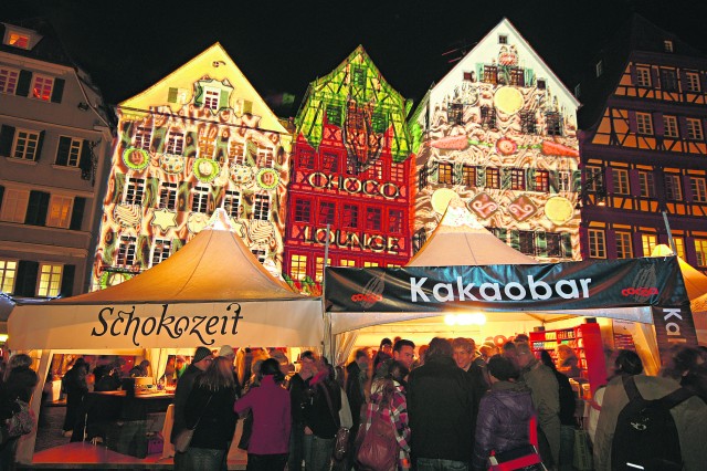 Tübingen’s historic half-timbered houses are festively illuminated during the International Chocolate Festival, or “chocolART,” the largest chocolate festival in Germany. This year’s festival will run Dec. 2-7 throughout Tübingen’s downtown area. Chocoholics may be happy to hear that chocolates can be sampled throughout the event. — Photo courtesy of Tübingen Erleben GmbH