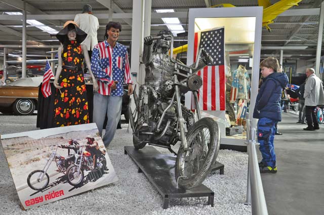 Linus Freyburger, 9, of Mannheim, investigates a Harley Davidson sculpture from the 1969 American film “Easy Rider,” starring Peter Fonda. The sculpture is made of recycled vehicle parts and was crafted by a team of eight craftsmen. For more information on the designs, visit www.giganten-aus-stahl.de. Aside from this American themed sculpture, the museum boasts 30 American dream cars under a banner: “Hollywood: Cars of the Stars.”