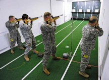 Participants compete in the air rifle portion of the European Regional Warrior Games time trials Feb. 12 on Vogelweh. The time trials are a competition to see how warriors stack up against their fellow brothers-in-arms in competitive events.