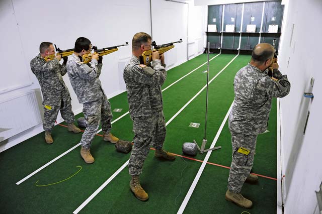 Participants compete in the air rifle portion of the European Regional Warrior Games time trials Feb. 12 on Vogelweh. The time trials are a competition to see how warriors stack up against their fellow brothers-in-arms in competitive events.