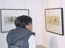 Photos by DCRVisitors of the “Americans ...” display in Ramstein-Miesenbach can admire cartoons created by Americans in the 1950s.