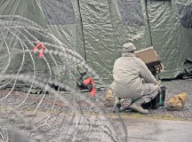 Airman 1st Class Lamar Richerson, 1st Combat Communications Squadron transmissions systems technician, manages a satellite dish as part of exercise Juniper Thunder Jan. 29 on Ramstein. Juniper Thunder is a joint communications exercise between Air Force and Army members with the focus on establishing bilateral communications across the two branch’s networks.