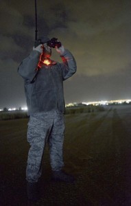 Photo by Senior Airman Timothy Moore Tech. Sgt. George Broom, 435th Air Mobility Squadron contingency airfield manager, looks through night vision goggles to monitor a C-130J Super Hercules’ runway approach Feb. 5 in Elefsis, Greece. The 435th Air Ground Operations Wing’s Contingency Response Group is implementing a new landing zone program that will allow CRG members to prepare landing zone operations, from picking the location to actually providing limited air traffic control. 