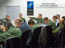 Photo by Cynthia VernatGen. Frank Gorenc (at head of table), Allied Air Command commander, leads a discussion with NATO air chiefs Feb. 5.