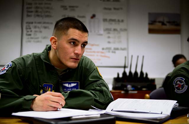 Senior Airman Juan Arce, 86th Aeromedical Evacuation Squadron technician, listens to a preflight briefing Feb. 6 on Ramstein. Arce and other 86th AES members took to the skies to test and hone their skills during a check ride sortie.