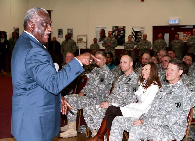 Retired Command Sgt. Maj. Leon Caffie engages the crowd assembled at the 7th Civil Support Command’s African-American Heritage/Black History Month event Feb. 8 at the Kaiserslautern Community Activities Center on Daenner Kaserne. Caffie, who was the guest speaker at the event, spent 39 years in the Army and Army Reserve, retiring as command sergeant major of the Army Reserve in 2010.