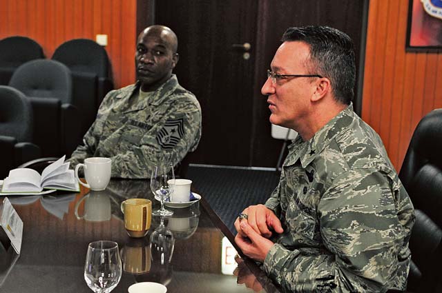 Brig. Gen. Patrick Mordente, 86th Airlift Wing commander, briefs Chief Master Sgt. Kaleth Wright, 3rd Air Force command chief, March 2 on Ramstein. Mordente and Wright discussed Ramstein’s mission and the capabilities of the Airmen during Wright’s immersion tour. During his visit, Wright toured many facilities, in addition to a C-130J Super Hercules modified for in-flight  surgeries.