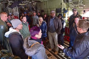 Photo by Staff Sgt. Sara KellerLt. Col. Jobie Turner (right), 37th Airlift Squadron commander, gives celebrities a tour of a U.S. Air Force C-130J Super Hercules during the USO Spring Visit.