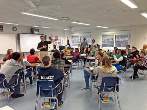 Photo by Didem ParkerAvid NewsKaiserslautern Middle School AVID students enjoy a presentation Feb. 28 by David Sear, Toastmaster Chapter of Kaiserslautern, as part of their AVID curriculum, where they get trained on public speaking. 