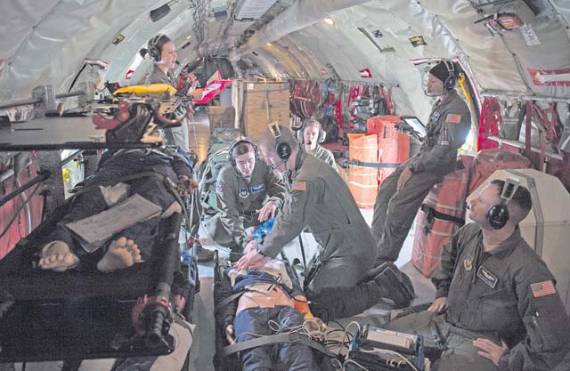 Airmen of the 86th Aeromedical Evacuation Squadron perform lifesaving procedures to a “patient” in a KC-135 Stratotanker. Aircrew and a KC-135 from Royal Air Force Mildenhall, England, spent multiple days at Ramstein performing aerial refueling missions, which also gave AES Airmen the opportunity to train on their mission inside a different airframe.