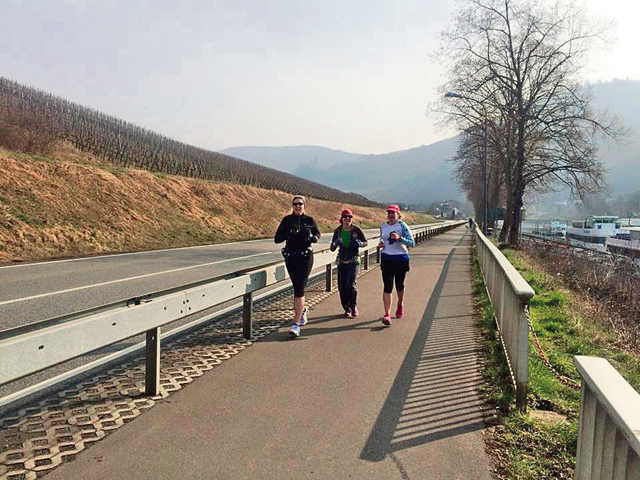 Courtesy photo by Linda Hitchcok Members of the Ramstein Runners run March 30 along the banks of the Moselle River in Bernkastel-Kues, Germany. The Ramstein Runners is a Kaiserslautern-based, women-only running group that provides opportunities for group fitness training and social networking for members of the KMC.