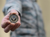 Photo by Airman 1st Class Deana Heitzman
The Airman’s coin signifies the beginning of an enlisted member’s career upon graduating basic military training. The original version of the Airman’s coin featured an eagle clawing its way out of the coin with the words “Aerospace Power” under it. The most recent coin replaced the eagle with the new Air Force symbol.