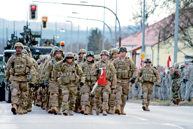 Soldiers from the 2nd Cavalry Regiment march into Rose Barracks, their home base, as they complete their 1,800km "Dragoon Ride" from Estonia, Lithuania and Poland on Apr. 1. 