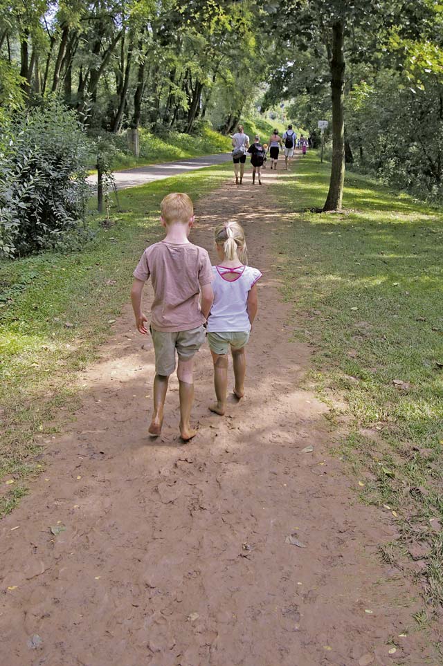 Walking on sunshine: Anna and Aiden Stamp enjoy fun and frolic at barefoot park,. 