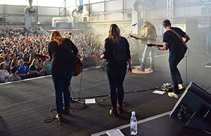 Adkins and his band perform during the USO concert.