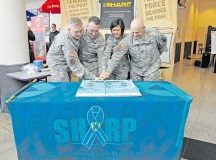 (From Left) Col. Shawn Wells, Brig. Gen. Patrick X. Mordente, 86th Airlift Wing commander, U.S. Army Garrison Rheinland-Pfalz commander, Chief Master Sgt. Joanne Bass, 86th Operations Group superintendent and Col. Barry Diehl, USAG Rhein-
land-Pfalz deputy commander, cut a cake at the Sexual Assault Aware-
ness and Prevention Month kickoff event April 1 at the  Kaiserslautern Military Community Center food court and included speakers and key leaders on hand for discussion.