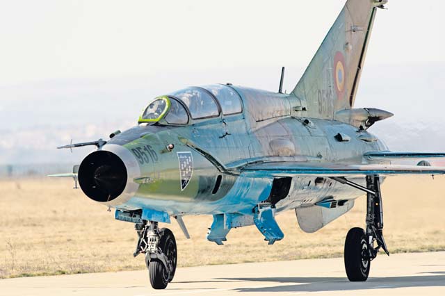 A Romanian MiG-21 exits the runway after a training sortie March 17 at Campia Turzii, Romania. Romanian and 480th Fighter Squadron Airmen trained together with more than 100 personnel from U.S. Air Force bases in Germany to establish a forward base and conduct operations from it.