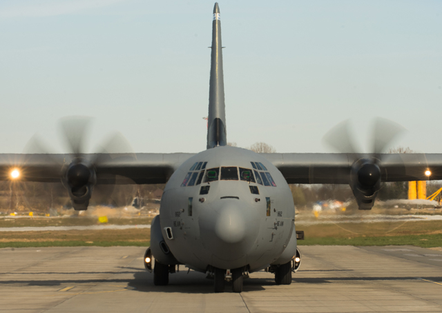 A C-130J Super Hercules assigned to the 37th Airlift Squadron, picks up Polish air force paratroopers at Krakow, Poland. Pilots from the 37th Airlift Squadron trained alongside their Polish counterparts in a nighttime low level, unimproved landing zone, dropping Polish air force paratroopers and more.