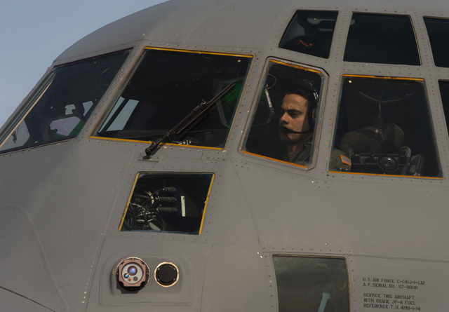 First Lt. Kenneth Hertzler, 37th Airlift Squadron pilot, prepares a C-130J Super Hercules for takeoff on April 9 at Powidz Air Base, Poland. 