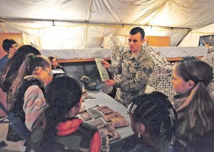  Staff Sgt. Gencian Blushi, 435th Construction and Training Squadron contingency instructor, teaches Ramstein Intermediate School students how to cook a meal ready-to eat. 