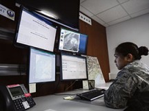 Staff Sgt. Yza Jones, 21st Operational Weather Squadron weather forecaster, reviews weather patterns on Vogelweh.