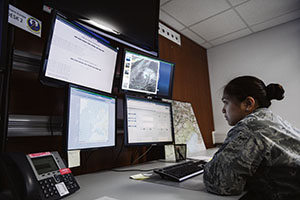 Staff Sgt. Yza Jones, 21st Operational Weather Squadron weather forecaster, reviews weather patterns on Vogelweh. 