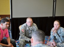 Senior noncommissioned officers  from the 21st Theater Sustainment Command and event cadre members, discuss sexual harassment/assault response and prevention training scenarios during the SHARP Summit.