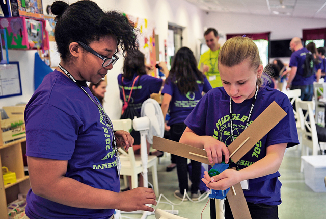 Middle school students construct a windmill during a STEMposium challenge May 13 on Ramstein. Middle school students from all around Germany were tested on their science, technology, engineering and math skills in different challenges.