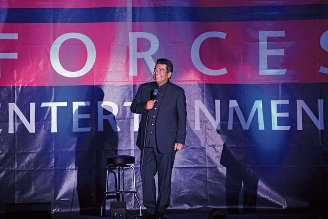 George Lopez, a comedian, actor and talk show host, entertains a crowd by performing his comedy routine for an Armed Forces Entertainment event May 16 on Ramstein.