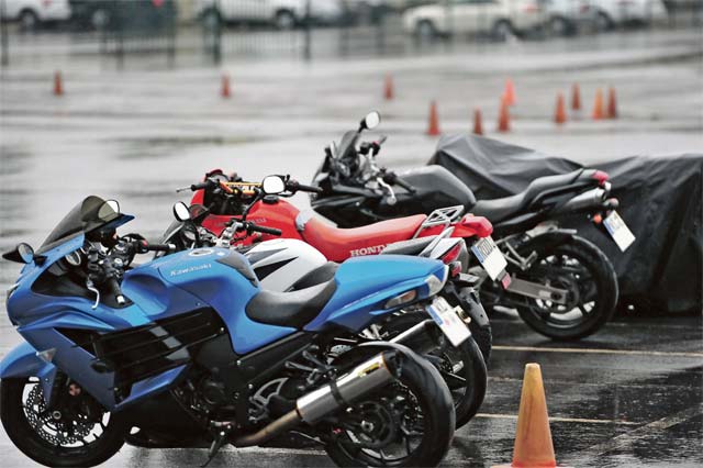 Photo by Marisa Alia-Novobilski, 21st TSC Public Affairs  Motorcycles sit outside of the MSF training offices on Kapaun Air Station during the sixth annual 21st TSC Motorcycle Safety Day training event June 18. Though the rainy weather prevented the group from taking their bikes out on the course, riders were still able to discuss best practices and safe riding skills while sharing tips on enjoying the roads safely in Europe.