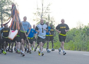 Command Sgt. Maj. Rodney Rhoades, the senior enlisted leader of the 21st Theater Sustainment Command, leads a formation of noncommissioned officers from across the 21st TSC and U.S. Army Garrison Rheinland-Pfalz on a three-mile Army birthday run on Rhine Ordnance Barracks June 12.
