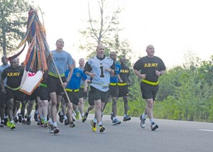Command Sgt. Maj. Rodney Rhoades, the senior enlisted leader of the 21st Theater Sustainment Command, leads a formation of noncommissioned officers from across the 21st TSC and U.S. Army Garrison Rheinland-Pfalz on a three-mile Army birthday run on Rhine Ordnance Barracks June 12. 