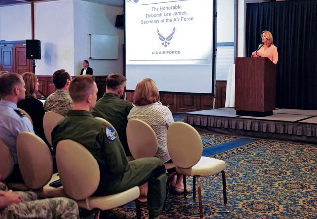 Photo by Staff Sgt. Leslie Keopka  U.S. Secretary of the Air Force Deborah Lee James speaks to U.S. Air Forces in Europe and Air Forces Africa personnel during an all-call June 19 on Ramstein. The SECAF attended the all-call during her brief stop at Ramstein and addressed the crowd on current topics in the Air Force and answered questions from the audience. 