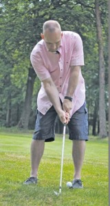 Command Sgt. Maj. Rodney Rhoades, the 21st Theater Sustain-ment Command senior enlisted leader, lines up a shot during the farewell golf scramble held in honor of the outgoing TSC commanding general June 8 at Woodlawn Golf Course on Ramstein Air Force Base. 